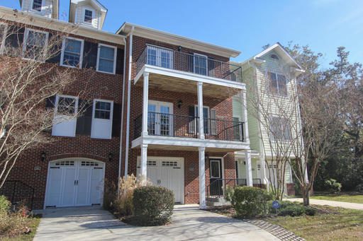 A large two story red coloured house at 265 Etiwan Pointe Drive Mount Pleasant, SC 29464