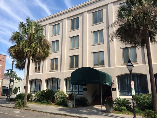 A large white coloured condo at 32 Vendue Range #300 Charleston, SC 29401