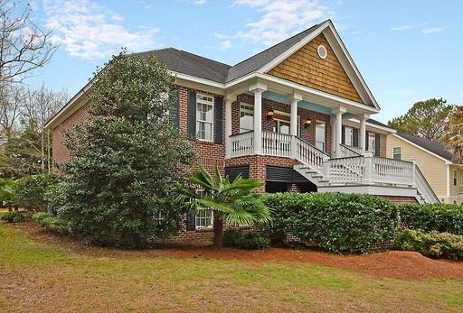 An image of two story red bricked house at 237 Ashmont Drive Charleston, SC 29492