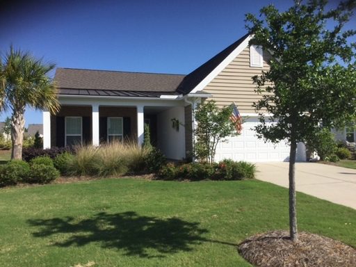 A one story house with large lawn in front of it at 462 Eastern Isle Avenue Summerville, SC 29486