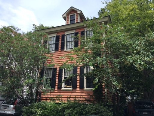 A story red house at 6 Radcliffe Place Charleston, SC 29403