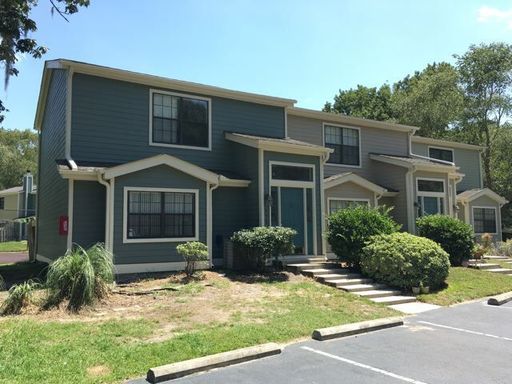 A two story black coloured house at Villa Maison Mount Pleasant, SC 29464