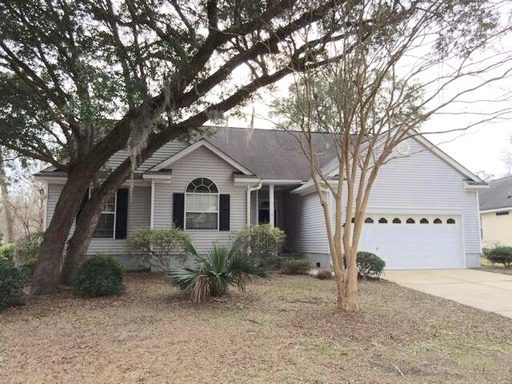 An image of white coloured house at 1215 Wild Olive Drive Mount Pleasant, SC 29464