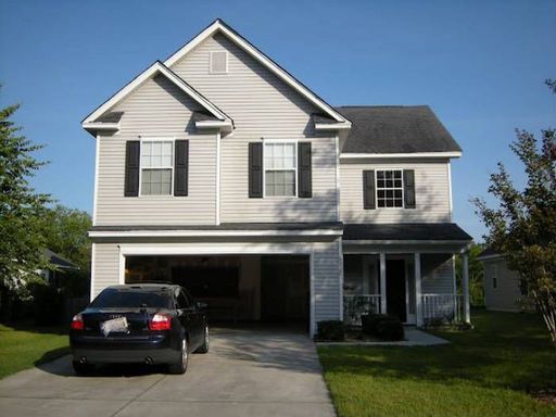 A two story white coloured house at Harleston Green Lane Mount Pleasant, SC 29466