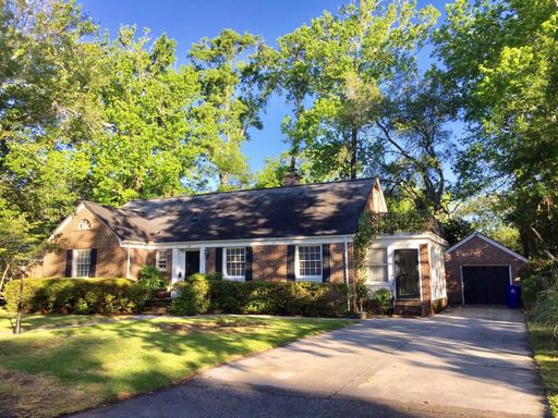 A single story house surrounded by greenery at Jamaica Drive Charleston, SC 29407