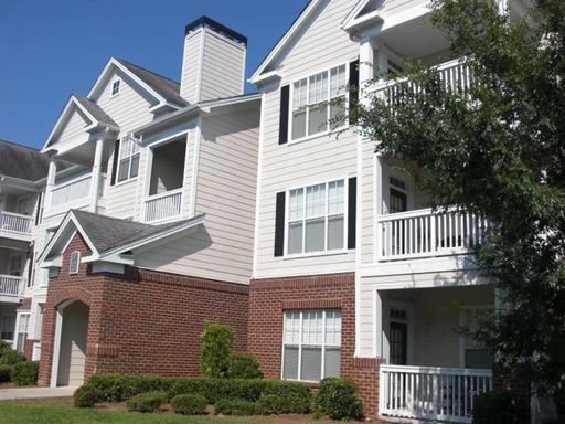 An image of white coloured condo house at 45 Sycamore Ave, #712 Charleston, SC 29407