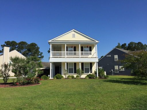 An image of two story house with lawn in front of it at 4802 West Red Maple Circle Summerville, SC 29485