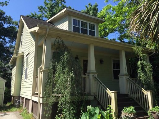 A single story green colour house at Carnegie Ave Charleston, SC 29407