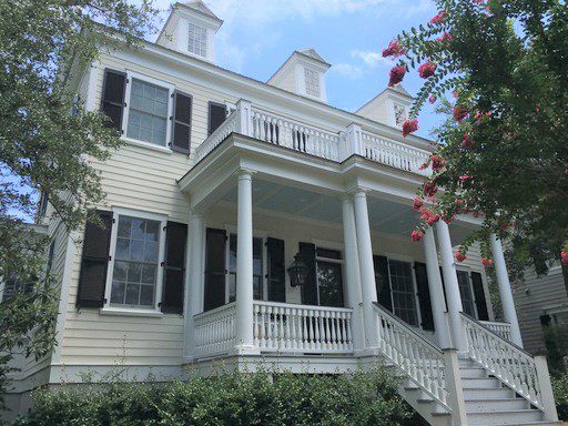 A two story white coloured house at King Georges Street Daniel Island, SC 29492