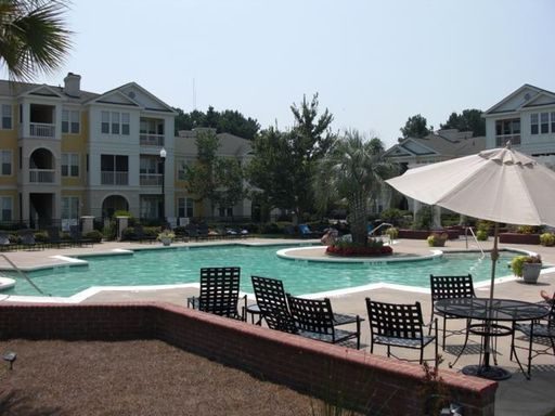 A large house and swimming pool in front of it at Chatelain Way Mount Pleasant, SC 29464