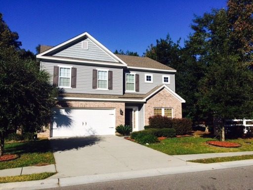 A two story house with lots of plats in front of it at 5000 W Liberty Meadows Drive Summerville, SC 29485