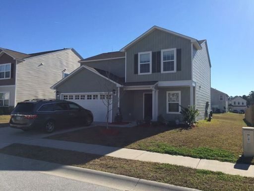 A two story house parked in front of it at 9704 Short Creek Drive Ladson, SC 29456