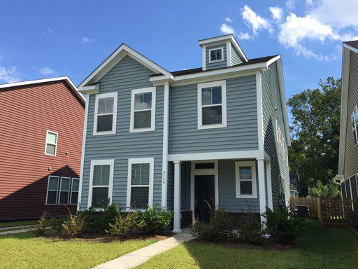 A two story black coloured townhouse at Moonlight Drive Charleston, SC 29414