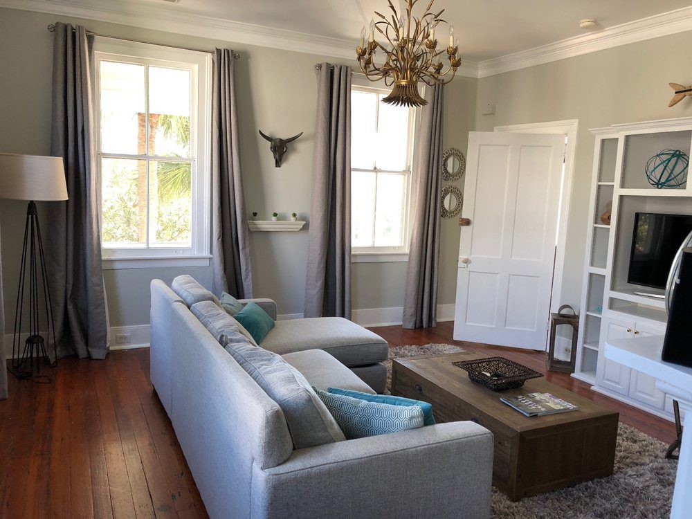 An inside image of the well furnished living room in the apartment