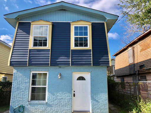 A two story blue coloured house at Athens Court Charleston, SC 29403