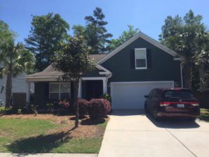 A single story black coloured house at North Liberty Meadows Drive Summerville, SC 29485