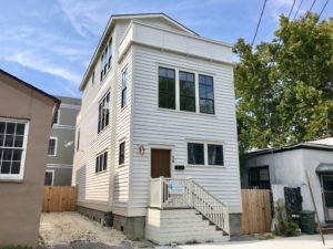 A two story white coloured 2300 F house at Eastside location in Downtown Charleston.