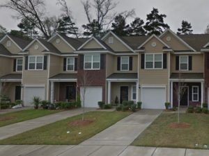 A yellow townhouse at Heldsberg Drive Charleston SC 29414