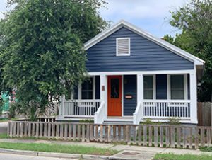 A single story black coloured house at Romney Street Charleston, SC 29403