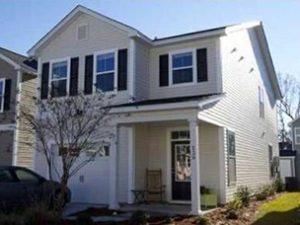 A two story house cream coloured house