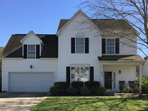 A two story white house at Ashford Circle Summerville, SC 29485