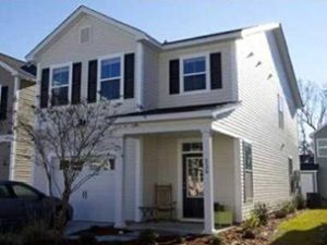 A two story house white coloured house at Larissa Drive Charleston, SC 29414